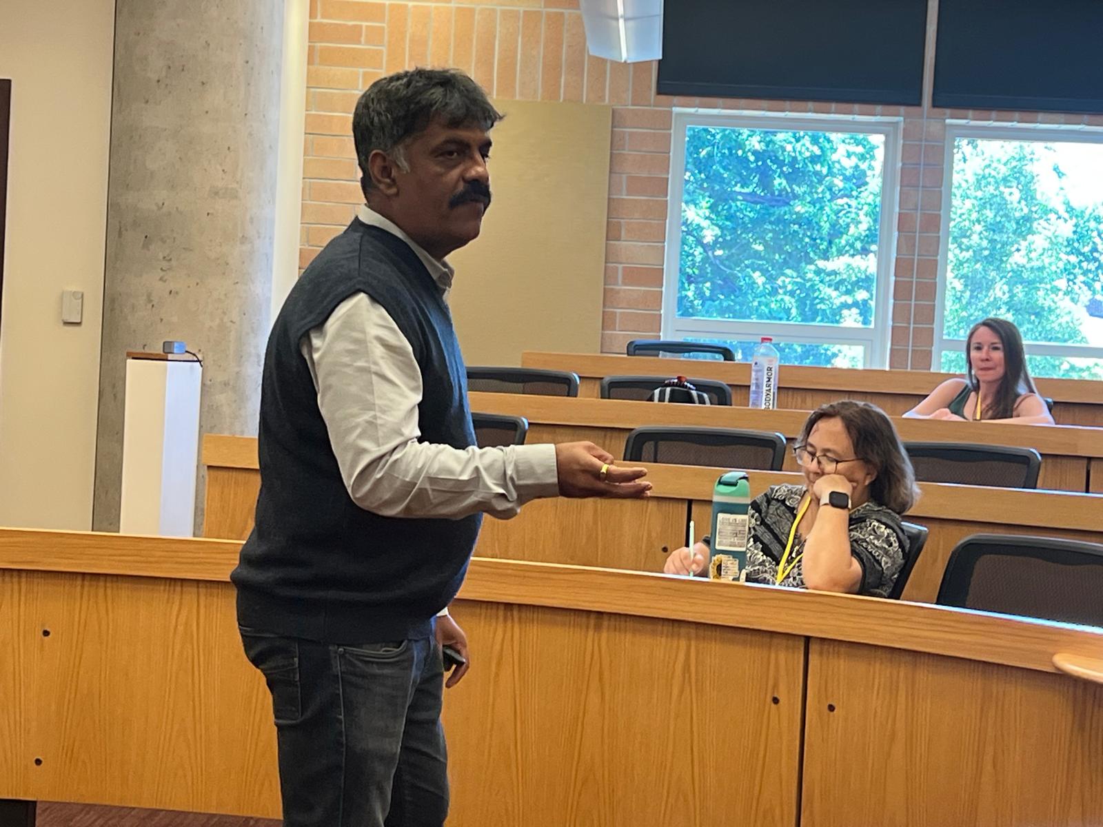 Dr. Sujit R. Jagadale addressing an audience mid-argument